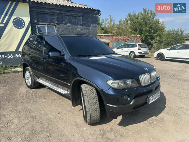 Синій БМВ Х5, об'ємом двигуна 2.98 л та пробігом 331 тис. км за 10999 $, фото 21 на Automoto.ua