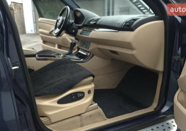 Синий БМВ Х5, объемом двигателя 4.4 л и пробегом 301 тыс. км за 8900 $, фото 12 на Automoto.ua