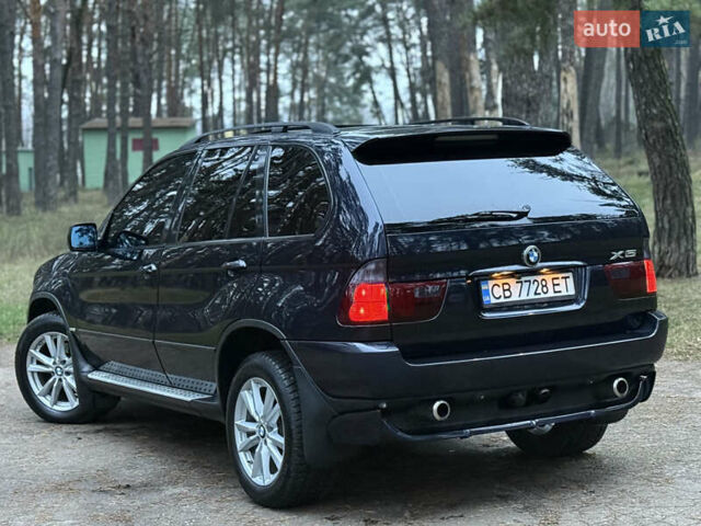 Синий БМВ Х5, объемом двигателя 3 л и пробегом 333 тыс. км за 9700 $, фото 4 на Automoto.ua