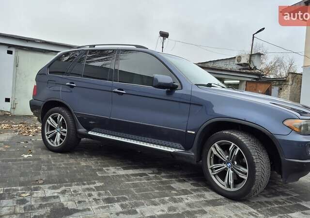 Синий БМВ Х5, объемом двигателя 4.4 л и пробегом 301 тыс. км за 8900 $, фото 9 на Automoto.ua