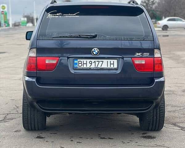 Синий БМВ Х5, объемом двигателя 3 л и пробегом 255 тыс. км за 11700 $, фото 4 на Automoto.ua