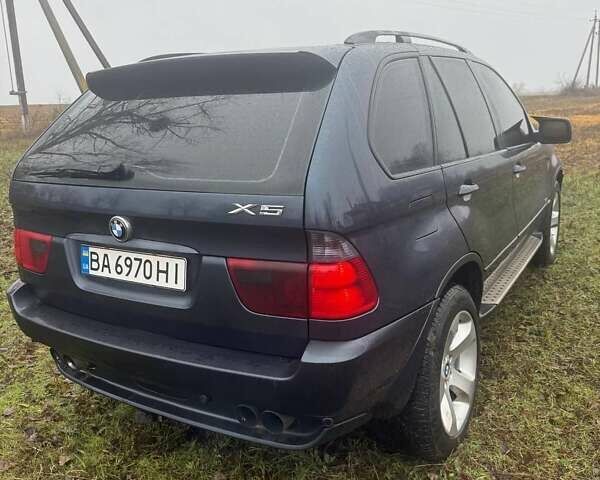 Синій БМВ Х5, об'ємом двигуна 2.99 л та пробігом 400 тис. км за 10500 $, фото 2 на Automoto.ua
