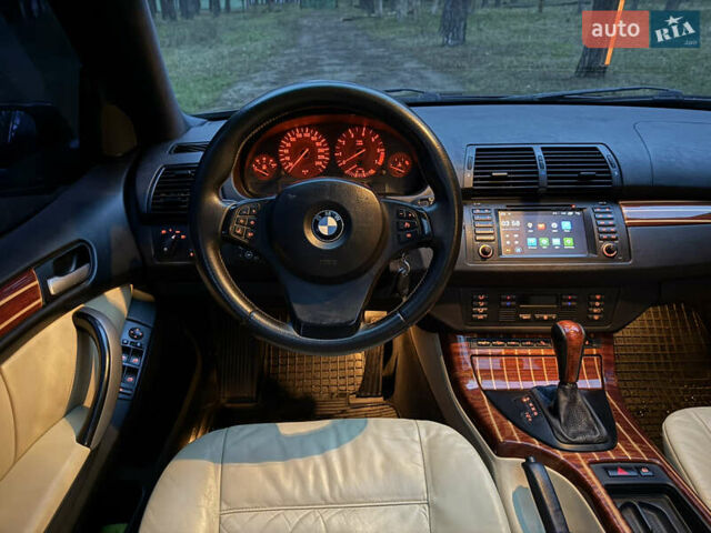 Синий БМВ Х5, объемом двигателя 3 л и пробегом 333 тыс. км за 9700 $, фото 21 на Automoto.ua