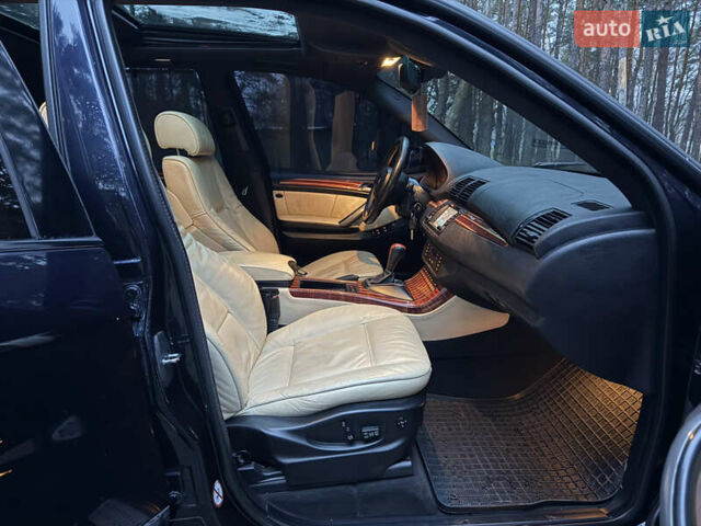 Синий БМВ Х5, объемом двигателя 3 л и пробегом 333 тыс. км за 9700 $, фото 13 на Automoto.ua