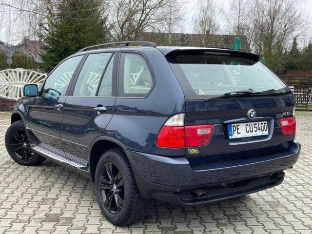 Синій БМВ Х5, об'ємом двигуна 3 л та пробігом 275 тис. км за 3023 $, фото 6 на Automoto.ua