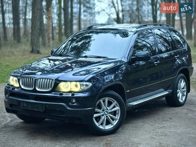 Синий БМВ Х5, объемом двигателя 3 л и пробегом 333 тыс. км за 9700 $, фото 6 на Automoto.ua