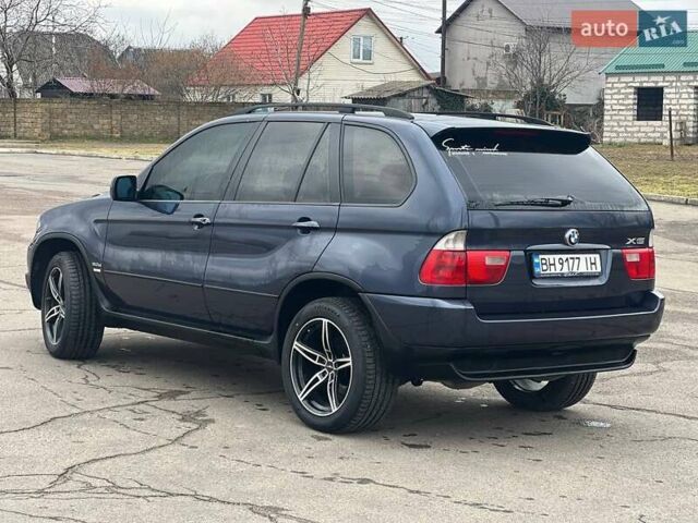 Синий БМВ Х5, объемом двигателя 3 л и пробегом 255 тыс. км за 11700 $, фото 3 на Automoto.ua