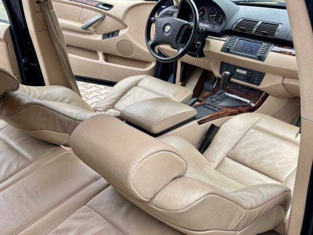 Синій БМВ Х5, об'ємом двигуна 3 л та пробігом 275 тис. км за 3023 $, фото 4 на Automoto.ua