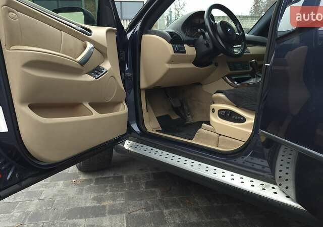 Синий БМВ Х5, объемом двигателя 4.4 л и пробегом 301 тыс. км за 8900 $, фото 10 на Automoto.ua