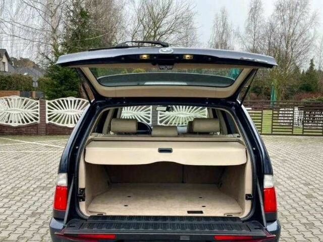 Синій БМВ Х5, об'ємом двигуна 3 л та пробігом 275 тис. км за 3023 $, фото 7 на Automoto.ua