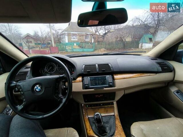 Синий БМВ Х5, объемом двигателя 3 л и пробегом 420 тыс. км за 5100 $, фото 9 на Automoto.ua