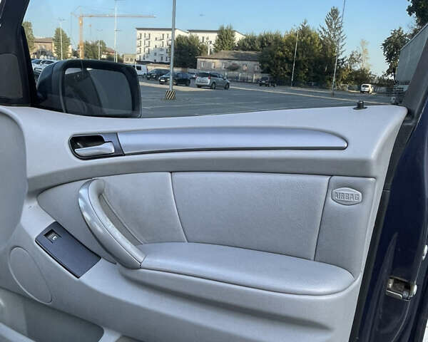 Синий БМВ Х5, объемом двигателя 3 л и пробегом 380 тыс. км за 12000 $, фото 46 на Automoto.ua