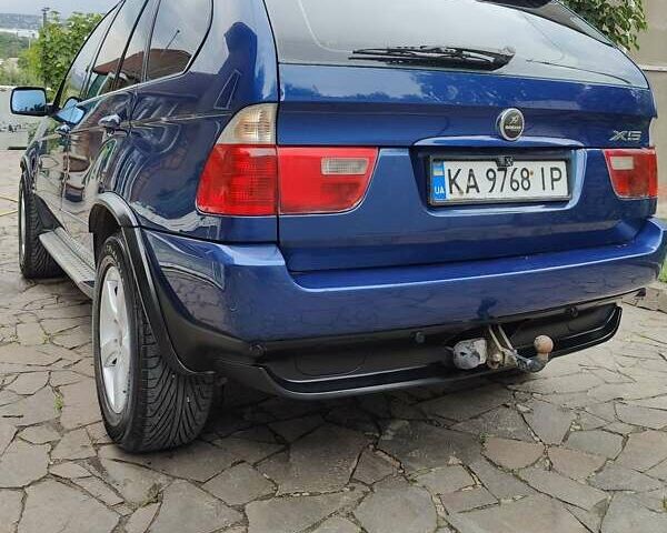 Синий БМВ Х5, объемом двигателя 2.99 л и пробегом 267 тыс. км за 11000 $, фото 4 на Automoto.ua