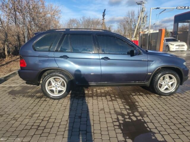 Синий БМВ Х5, объемом двигателя 3 л и пробегом 342 тыс. км за 5700 $, фото 4 на Automoto.ua