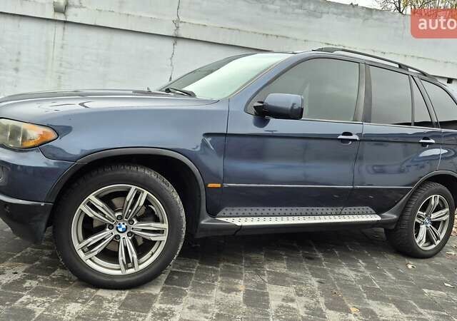 Синий БМВ Х5, объемом двигателя 4.4 л и пробегом 301 тыс. км за 8900 $, фото 15 на Automoto.ua