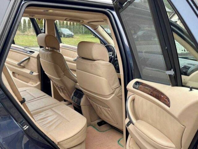 Синій БМВ Х5, об'ємом двигуна 3 л та пробігом 275 тис. км за 3023 $, фото 5 на Automoto.ua