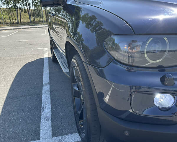 Синий БМВ Х5, объемом двигателя 3 л и пробегом 279 тыс. км за 11200 $, фото 7 на Automoto.ua