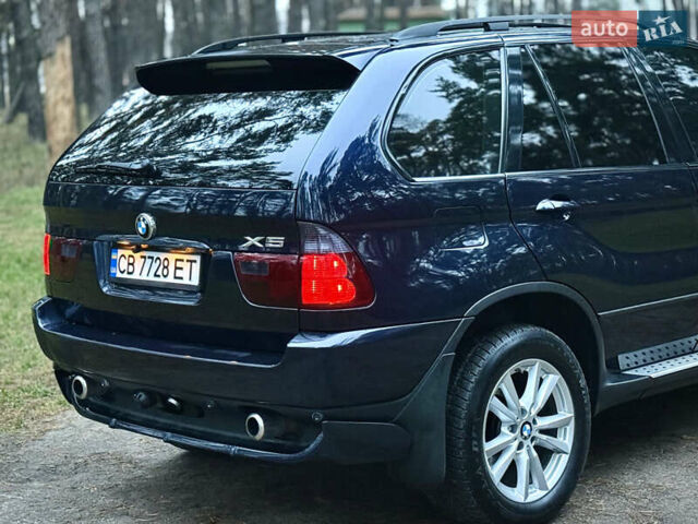 Синий БМВ Х5, объемом двигателя 3 л и пробегом 333 тыс. км за 9700 $, фото 3 на Automoto.ua