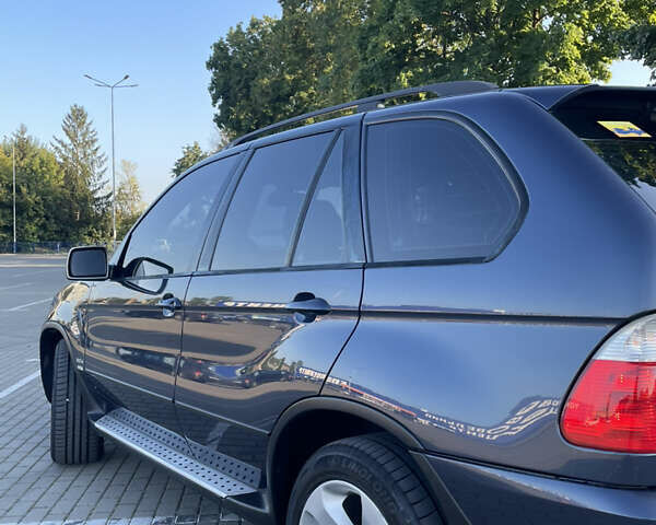 Синий БМВ Х5, объемом двигателя 3 л и пробегом 380 тыс. км за 12000 $, фото 12 на Automoto.ua