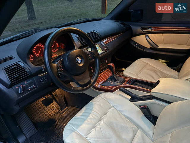 Синий БМВ Х5, объемом двигателя 3 л и пробегом 333 тыс. км за 9700 $, фото 24 на Automoto.ua
