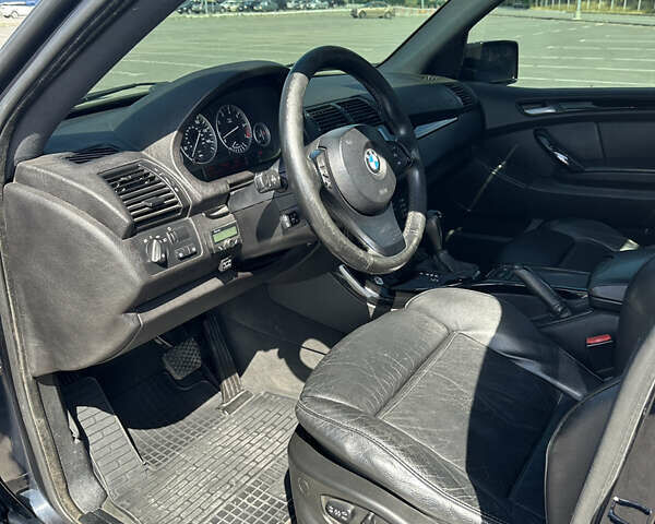 Синий БМВ Х5, объемом двигателя 3 л и пробегом 279 тыс. км за 11200 $, фото 15 на Automoto.ua