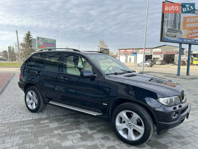 Синій БМВ Х5, об'ємом двигуна 3 л та пробігом 221 тис. км за 19300 $, фото 44 на Automoto.ua