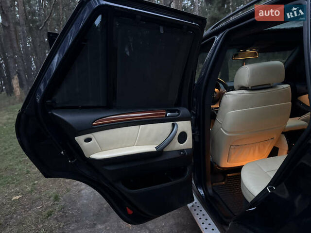 Синий БМВ Х5, объемом двигателя 3 л и пробегом 333 тыс. км за 9700 $, фото 33 на Automoto.ua