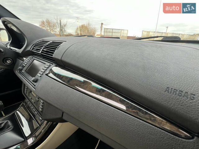 Синій БМВ Х5, об'ємом двигуна 3 л та пробігом 221 тис. км за 19300 $, фото 80 на Automoto.ua