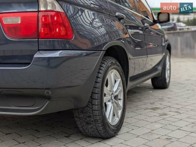 Синій БМВ Х5, об'ємом двигуна 3 л та пробігом 362 тис. км за 12700 $, фото 33 на Automoto.ua