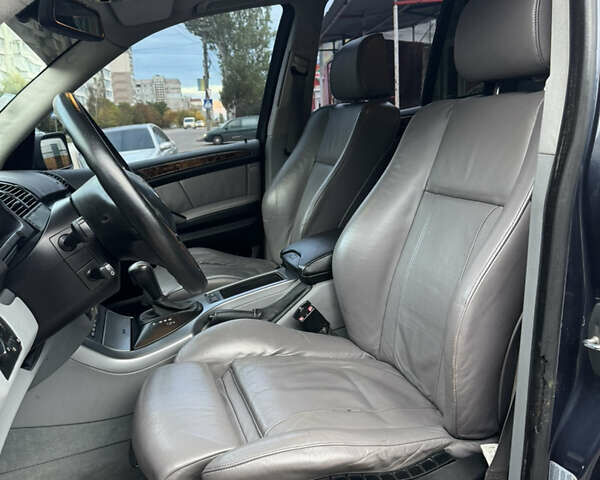 Синій БМВ Х5, об'ємом двигуна 3 л та пробігом 340 тис. км за 6299 $, фото 19 на Automoto.ua