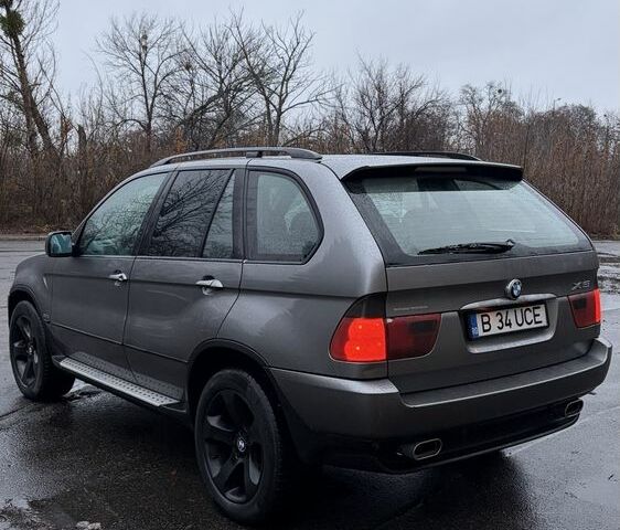 Синий БМВ Х5, объемом двигателя 3 л и пробегом 300 тыс. км за 6200 $, фото 6 на Automoto.ua