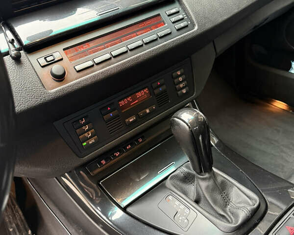 Синий БМВ Х5, объемом двигателя 2.99 л и пробегом 293 тыс. км за 11500 $, фото 9 на Automoto.ua