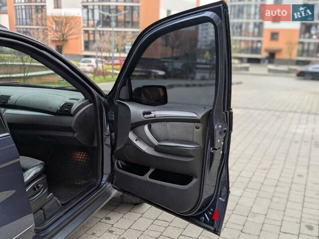 Синій БМВ Х5, об'ємом двигуна 3 л та пробігом 362 тис. км за 12700 $, фото 55 на Automoto.ua