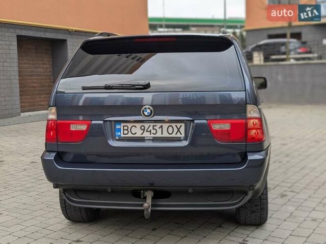 Синій БМВ Х5, об'ємом двигуна 3 л та пробігом 362 тис. км за 12700 $, фото 30 на Automoto.ua