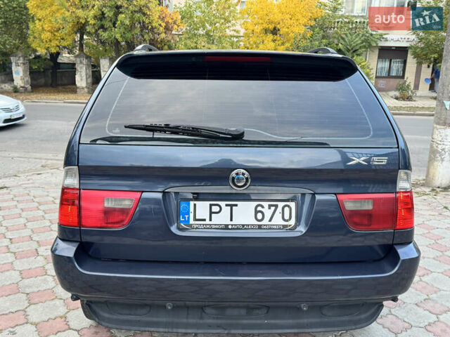Синій БМВ Х5, об'ємом двигуна 3 л та пробігом 340 тис. км за 6299 $, фото 5 на Automoto.ua