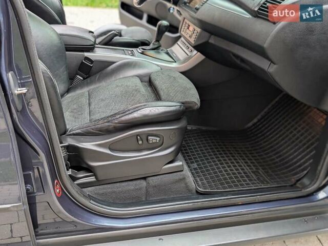 Синій БМВ Х5, об'ємом двигуна 3 л та пробігом 362 тис. км за 12700 $, фото 57 на Automoto.ua