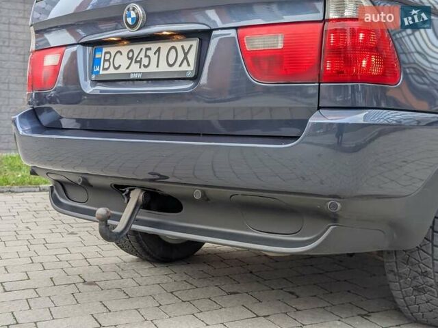 Синій БМВ Х5, об'ємом двигуна 3 л та пробігом 362 тис. км за 12700 $, фото 32 на Automoto.ua