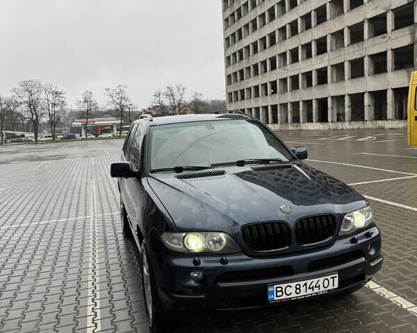Синий БМВ Х5, объемом двигателя 2.99 л и пробегом 293 тыс. км за 11500 $, фото 2 на Automoto.ua