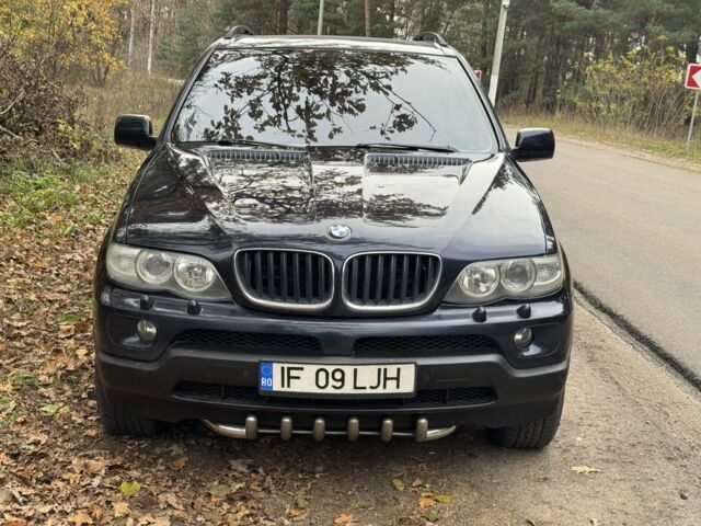 Синий БМВ Х5, объемом двигателя 3 л и пробегом 230 тыс. км за 4600 $, фото 3 на Automoto.ua