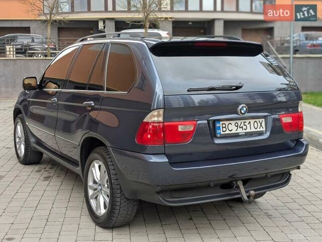 Синій БМВ Х5, об'ємом двигуна 3 л та пробігом 362 тис. км за 12700 $, фото 29 на Automoto.ua