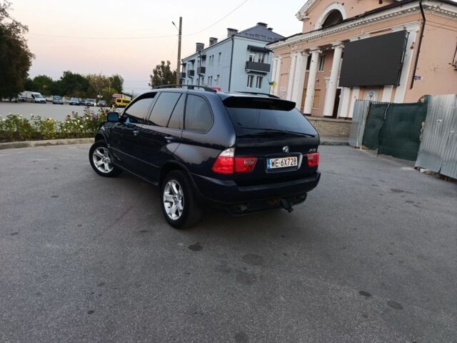 Синий БМВ Х5, объемом двигателя 3 л и пробегом 300 тыс. км за 5400 $, фото 1 на Automoto.ua
