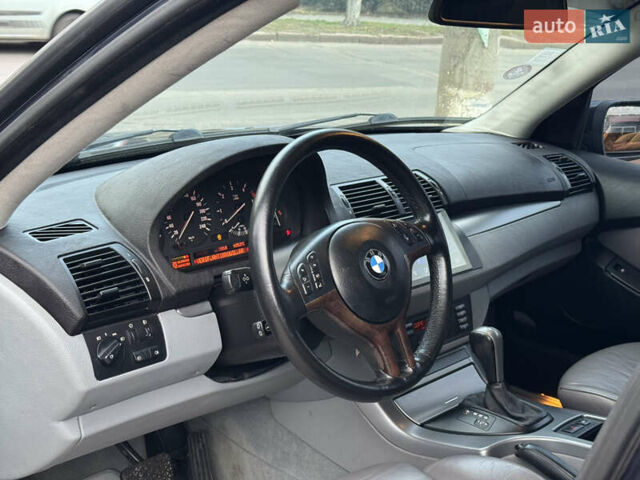 Синій БМВ Х5, об'ємом двигуна 3 л та пробігом 340 тис. км за 6299 $, фото 14 на Automoto.ua