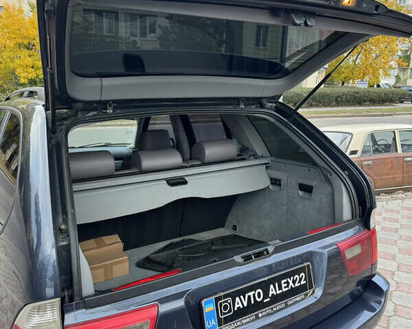 Синій БМВ Х5, об'ємом двигуна 3 л та пробігом 340 тис. км за 6299 $, фото 22 на Automoto.ua