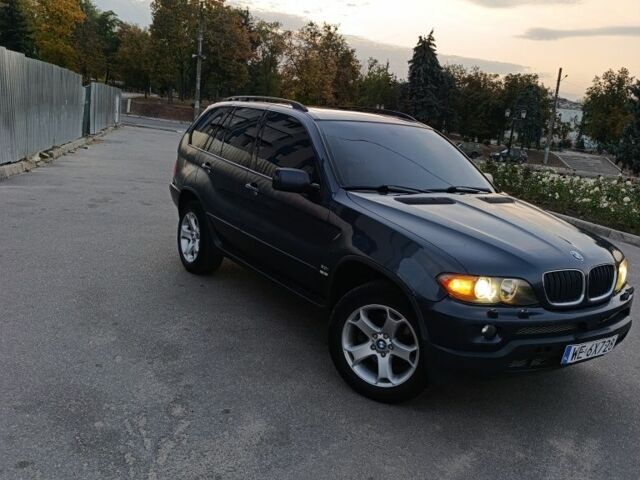 Синий БМВ Х5, объемом двигателя 3 л и пробегом 300 тыс. км за 5400 $, фото 2 на Automoto.ua