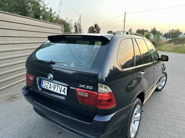 Синий БМВ Х5, объемом двигателя 3 л и пробегом 350 тыс. км за 7400 $, фото 4 на Automoto.ua
