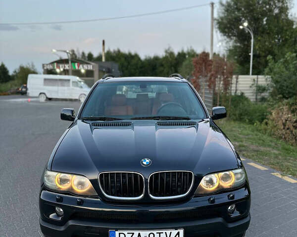 Синий БМВ Х5, объемом двигателя 3 л и пробегом 350 тыс. км за 7400 $, фото 3 на Automoto.ua