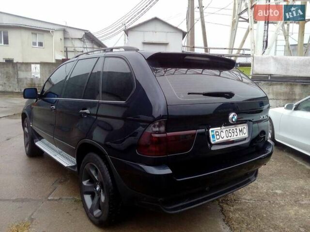 Синій БМВ Х5, об'ємом двигуна 2.99 л та пробігом 505 тис. км за 12000 $, фото 4 на Automoto.ua