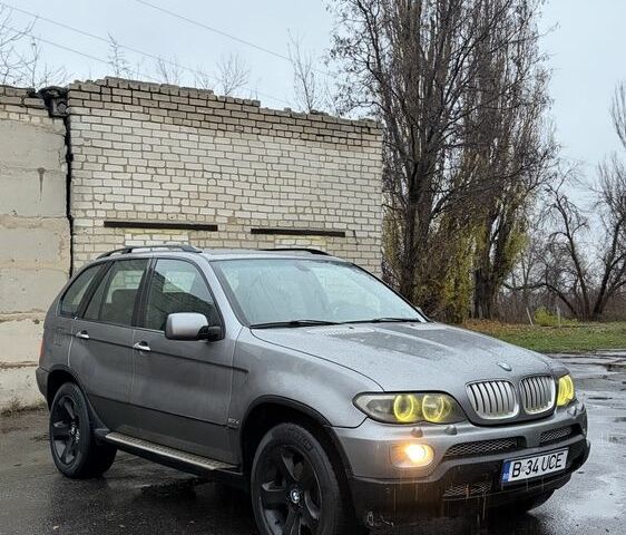 Синий БМВ Х5, объемом двигателя 3 л и пробегом 300 тыс. км за 6200 $, фото 2 на Automoto.ua