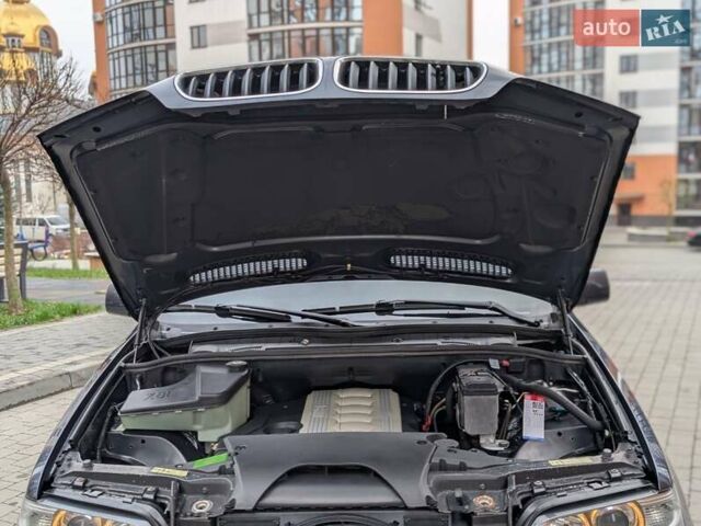 Синій БМВ Х5, об'ємом двигуна 3 л та пробігом 362 тис. км за 12700 $, фото 21 на Automoto.ua