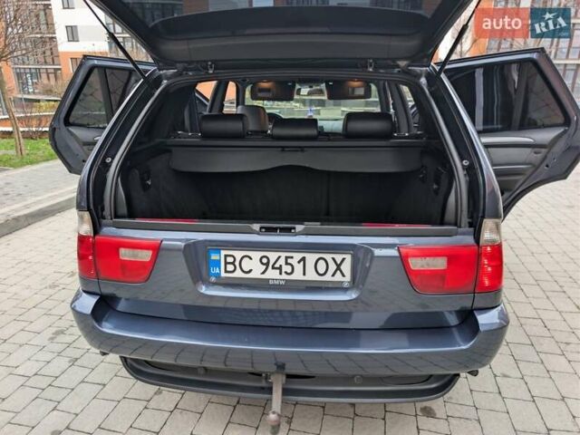 Синій БМВ Х5, об'ємом двигуна 3 л та пробігом 362 тис. км за 12700 $, фото 75 на Automoto.ua